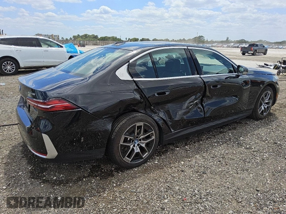 2024 BMW i5 eDrive40 with VIN WBY33FK02RCR91118, listed as a Copart auction lot 53308205 with Not Provided miles and Clean Title. Bid and sale history available at DreamBid. Image 3.