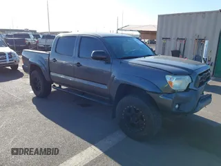 2013 Toyota Tacoma PreRunner z VIN 5TFJX4GN6DX020761, wystawiony jako IAAI lot #41766230 z przebiegiem 74 113 mil mil oraz . Historia ofert i sprzedaży dostępna na DreamBid. Obrazek 1.