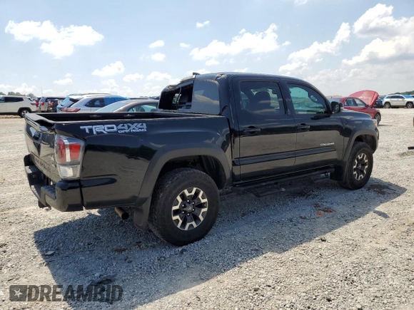 2023 Toyota Tacoma SR with VIN 3TMCZ5AN3PM571922, listed as a Copart auction lot 61872775 with 34,501 mi miles and Salvage title. Bid and sale history available at DreamBid. Image 3.