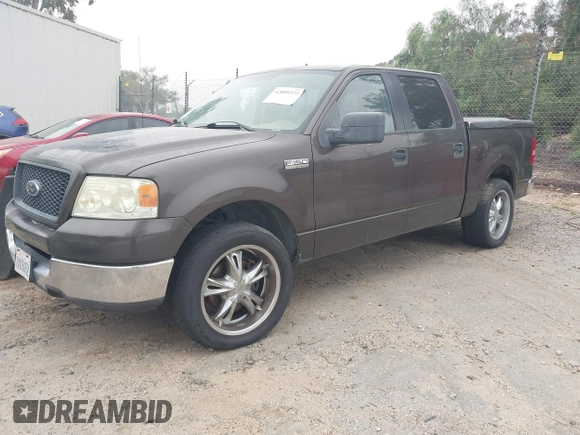 2005 Ford F-150 XLT with VIN 1FTRW12W15KE64553, listed as a IAAI auction lot 42009373 with 106,454 mi miles. Bid and sale history available at carsss.com. Image 2.