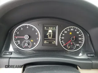 2012 Volkswagen Tiguan LE z VIN WVGAV7AX2CW004641, wystawiony jako Copart lot #44508485 z przebiegiem 60 711 mil mil oraz Szkoda całkowita • Salvage title. Historia ofert i sprzedaży dostępna na DreamBid. Obrazek 9.