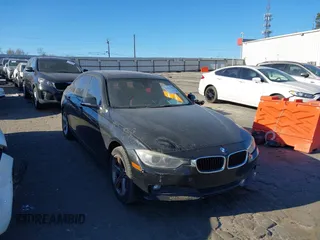 2014 BMW 3 Series 328i with VIN WBA3A5G59ENP31817, listed as a IAAI auction lot 41845296 with 190,437 mi miles. Bid and sale history available at carsss.com. Image 1.