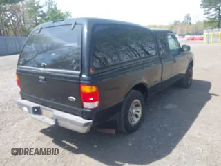 1999 Ford Ranger XL with VIN 1FTYR14V5XPB00021, listed as a IAAI auction lot 42129559 with 181,005 mi miles. Bid and sale history available at carsss.com. Image 4.