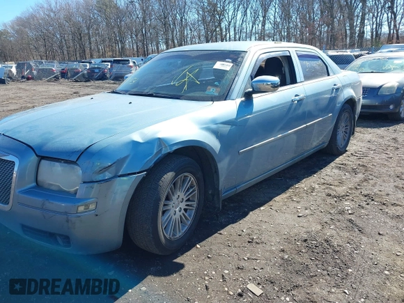 2009 Chrysler 300 LX with VIN 2C3KA43D19H552759, listed as a IAAI auction lot 41702989 with 172,572 mi miles. Bid and sale history available at carsss.com. Image 2.