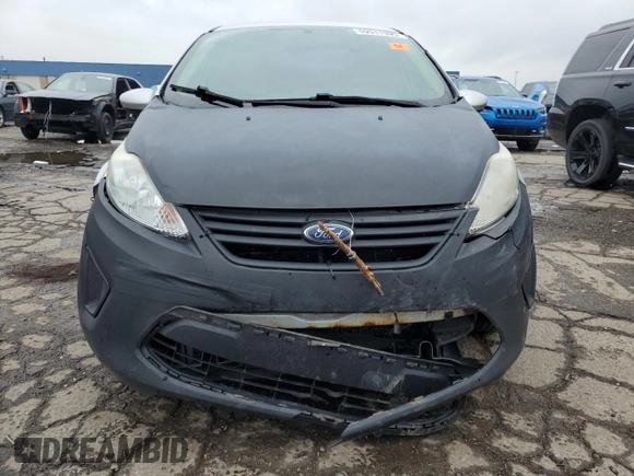 2012 Ford Fiesta SE z VIN 3FADP4BJ4CM125634, wystawiony jako Copart lot #59911995 z przebiegiem 168 371 mil mil oraz Czysty tytuł • Clean title. Historia ofert i sprzedaży dostępna na DreamBid. Obrazek 5.