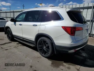 2017 Honda Pilot Touring with VIN 5FNYF6H91HB007611, listed as a Copart auction lot 47217175 with 107,349 mi miles and Salvage Title. Bid and sale history available at DreamBid. Image 2.