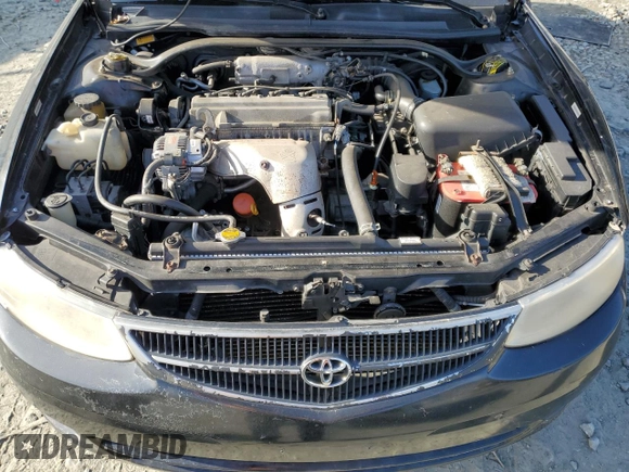1999 Toyota Solara SE with VIN 2T1CG22P1XC195671, listed as a Copart auction lot 80575724 with 185,634 mi miles and Salvage Title. Bid and sale history available at DreamBid. Image 12.
