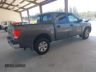 2005 Nissan Titan LE with VIN 1N6AA07B05N572685, listed as a IAAI auction lot 42692229 with 200,583 mi miles and . Bid and sale history available at DreamBid. Image 4.