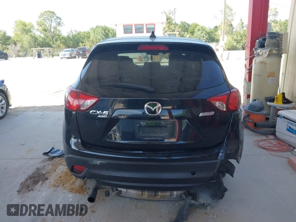 2015 Mazda CX-5 Grand Touring with VIN JM3KE4DY7F0481883, listed as a IAAI auction lot 42091709 with 184,248 mi miles and . Bid and sale history available at DreamBid. Image 17.