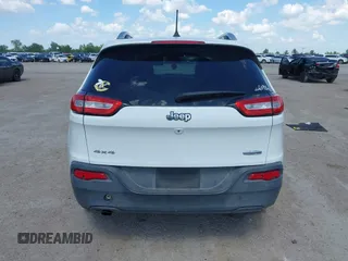 2016 Jeep Cherokee Latitude z VIN 1C4PJMCB9GW305259, wystawiony jako IAAI lot #42093050 z przebiegiem 228 747 mil mil oraz . Historia ofert i sprzedaży dostępna na DreamBid. Obrazek 16.