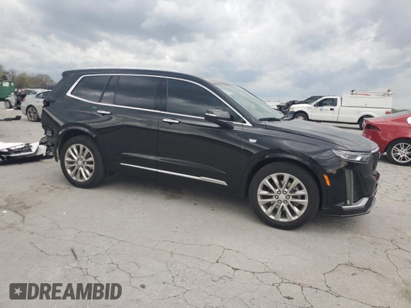 2021 Cadillac XT6 Premium Luxury z VIN 1GYKPCRS1MZ169952, wystawiony jako Copart lot #51908895 z przebiegiem 31 834 mil mil oraz Szkody całkowita. Historia ofert i sprzedaży dostępna na DreamBid. Obrazek 4.