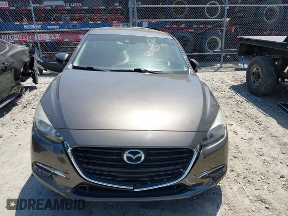 2017 Mazda 3 Grand Touring z VIN 3MZBN1M39HM127811, wystawiony jako IAAI lot #42060315 z przebiegiem Nie podano mil oraz . Historia ofert i sprzedaży dostępna na DreamBid. Obrazek 11.