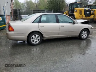 2000 Toyota Avalon XL with VIN 4T1BF28B1YU033159, listed as a Copart auction lot 52796755 with 247,062 mi miles and Salvage Title. Bid and sale history available at DreamBid. Image 3.