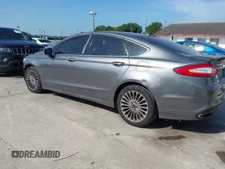 2014 Ford Fusion Titanium with VIN 3FA6P0K90ER358536, listed as a IAAI auction lot 41931474 with 170,856 mi miles. Bid and sale history available at carsss.com. Image 3.