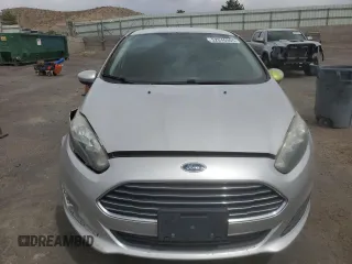 2014 Ford Fiesta SE z VIN 3FADP4BJ8EM133030, wystawiony jako Copart lot #52046065 z przebiegiem 113 792 mil mil oraz Szkoda całkowita • Salvage title. Historia ofert i sprzedaży dostępna na DreamBid. Obrazek 5.