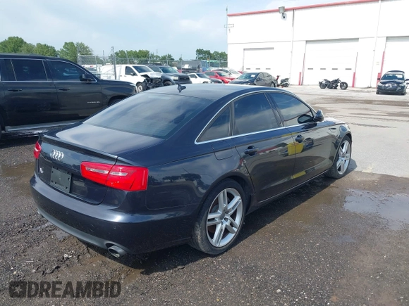 2014 Audi A6 Premium Plus with VIN WAUDFAFC7EN052529, listed as a IAAI auction lot 42667659 with 143,668 mi miles and . Bid and sale history available at DreamBid. Image 4.