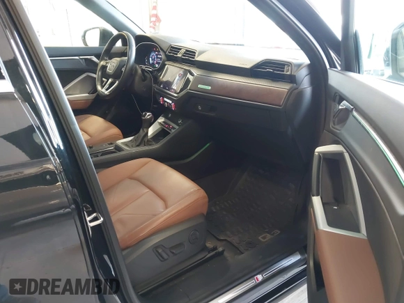 2021 Audi Q3 S line Premium Plus with VIN WA1EECF32M1054629, listed as a IAAI auction lot 41588322 with 33,385 mi miles and . Bid and sale history available at DreamBid. Image 5.