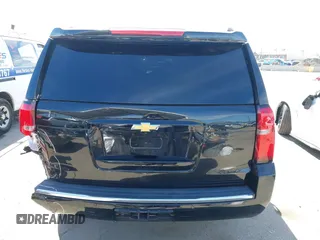 2019 Chevrolet Suburban LT with VIN 1GNSCJKCXKR332739, listed as a IAAI auction lot 41636530 with 104,997 mi miles and . Bid and sale history available at DreamBid. Image 16.
