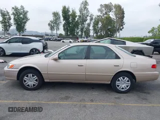 2001 Toyota Camry CE with VIN 4T1BG22K81U075758, listed as a IAAI auction lot 42024950 with 107,439 mi miles. Bid and sale history available at carsss.com. Image 14.