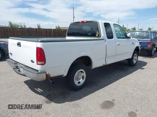 2001 Ford F-150 XL z VIN 1FTRX18W31KF80478, wystawiony jako IAAI lot #42219605 z przebiegiem 127 284 mil mil oraz . Historia ofert i sprzedaży dostępna na DreamBid. Obrazek 4.