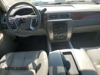 2007 GMC Yukon SLT with VIN 1GKFK13057J345796, listed as a Copart auction lot 71773124 with 218,788 mi miles and Salvage Title. Bid and sale history available at carsss.com. Image 8.