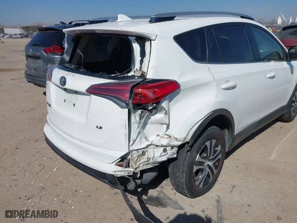 2016 Toyota RAV4 LE with VIN JTMZFREV7GJ096390, listed as a IAAI auction lot 41599268 with 94,568 mi miles. Bid and sale history available at carsss.com. Image 6.
