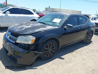 2014 Dodge Avenger SE with VIN 1C3CDZAB1EN133550, listed as a IAAI auction lot 42033001 with 137,592 mi miles. Bid and sale history available at carsss.com. Image 17.