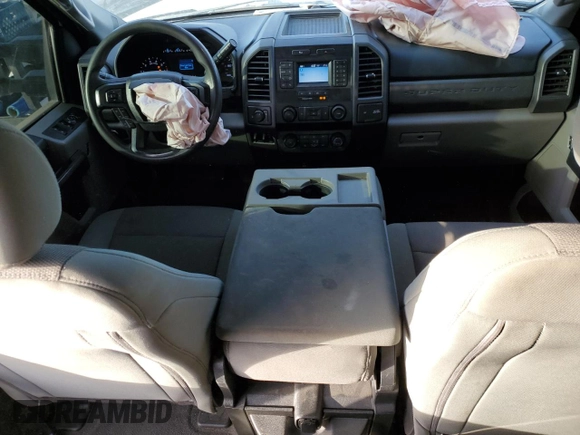 2020 Ford F-250 XL with VIN 1FT7W2A64LEC12385, listed as a Copart auction lot 77958334 with 122,635 mi miles and Salvage title. Bid and sale history available at DreamBid. Image 8.