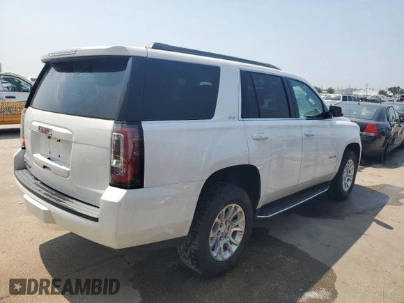 2020 GMC Yukon SLT with VIN 1GKS1BKC0LR243224, listed as a Copart auction lot 65768234 with 129,702 mi miles and Salvage Title. Bid and sale history available at DreamBid. Image 3.
