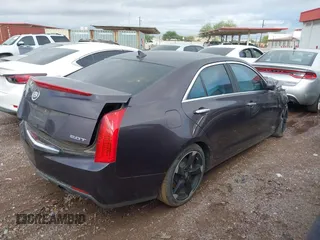2014 Cadillac ATS Standard RWD with VIN 1G6AA5RX9E0101644, listed as a IAAI auction lot 42333033 with Not provided miles and . Bid and sale history available at DreamBid. Image 4.