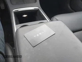 2023 Tesla Model 3 z VIN 5YJ3E1EA0PF511158, wystawiony jako IAAI lot #42210455 z przebiegiem 22 291 mil mil oraz . Historia ofert i sprzedaży dostępna na DreamBid. Obrazek 11.