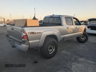 2015 Toyota Tacoma PreRunner with VIN 3TMKU4HN8FM044970, listed as a Copart auction lot 81277284 with 106,660 mi miles and Salvage title. Bid and sale history available at DreamBid. Image 3.