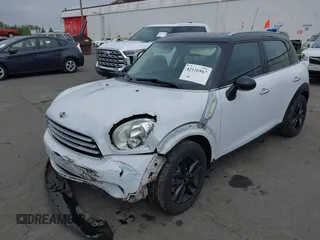 2012 MINI Countryman with VIN WMWZB3C57CWM04258, listed as a IAAI auction lot 42116867 with 168,550 mi miles and . Bid and sale history available at DreamBid. Image 6.