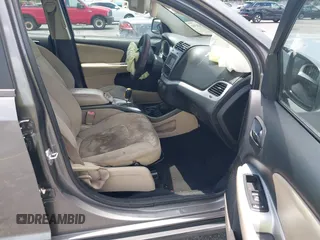 2013 Dodge Journey SE with VIN 3C4PDCAB3DT626929, listed as a IAAI auction lot 42318702 with Not provided miles and . Bid and sale history available at DreamBid. Image 5.