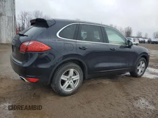 2012 Porsche Cayenne with VIN WP1AA2A21CLA06582, listed as a Copart auction lot 52546435 with 165,731 mi miles and Clean title. Bid and sale history available at DreamBid. Image 3.