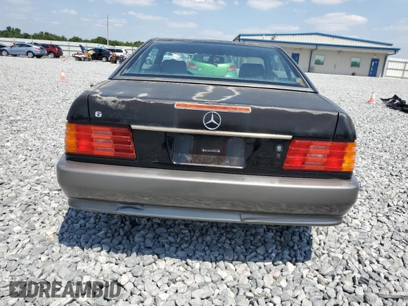 1990 Mercedes-Benz 300 with VIN WDBFA61E3LF005181, listed as a Copart auction lot 54248995 with 142,368 mi miles and Clean Title. Bid and sale history available at DreamBid. Image 6.