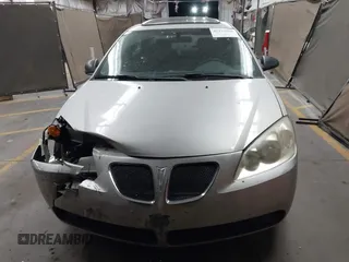 2005 Pontiac G6 z VIN 1G2ZG528154120400, wystawiony jako IAAI lot #42332980 z przebiegiem 171 359 mil mil oraz . Historia ofert i sprzedaży dostępna na DreamBid. Obrazek 12.