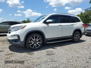 2019 Honda Pilot Touring 7-Passenger z VIN 5FNYF6H66KB006337, wystawiony jako Copart lot #57097575 z przebiegiem 25 055 mil mil oraz Szkoda całkowita • Salvage title. Historia ofert i sprzedaży dostępna na DreamBid. Obrazek 1.