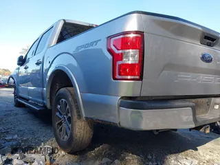 2019 Ford F-150 XL with VIN 1FTEW1CP5KFA84724, listed as a IAAI auction lot 41481894 with 135,051 mi miles and . Bid and sale history available at carsss.com. Image 3.
