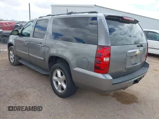 2007 Chevrolet Suburban LT with VIN 1GNFK16327J242103, listed as a IAAI auction lot 42172990 with 185,103 mi miles and . Bid and sale history available at DreamBid. Image 3.
