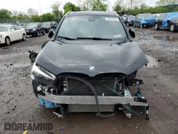 2021 BMW X1 xDrive28i with VIN WBXJG9C05M5T03982, listed as a Copart auction lot 55384025 with 24,309 mi miles and Salvage Title. Bid and sale history available at DreamBid. Image 5.