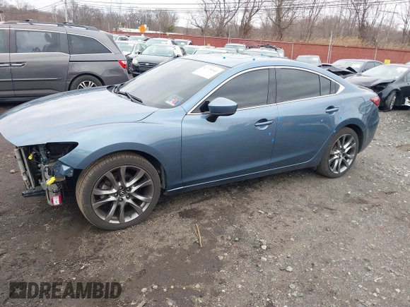 2017 Mazda 6 Grand Touring with VIN JM1GL1X52H1109210, listed as a IAAI auction lot 41738041 with 127,585 mi miles. Bid and sale history available at carsss.com. Image 2.