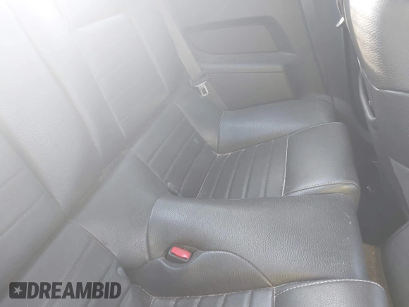 2012 Ford Mustang Premium with VIN 1ZVBP8AM7C5288124, listed as a IAAI auction lot 42280797 with 188,223 mi miles and . Bid and sale history available at DreamBid. Image 8.