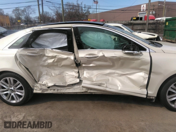 2014 Lincoln MKZ Hybrid with VIN 3LN6L2LU2ER805061, listed as a IAAI auction lot 42022156 with Not provided miles and . Bid and sale history available at DreamBid. Image 6.