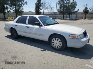 2011 Ford Police Interceptor with VIN 2FABP7BV4BX167977, listed as a Copart auction lot 61819025 with 104,769 mi miles and Salvage title. Bid and sale history available at DreamBid. Image 4.