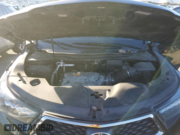 2020 Acura MDX Technology z VIN 5J8YD4H04LL023868, wystawiony jako Copart lot #88157305 z przebiegiem Nie podano mil oraz Szkoda całkowita • Salvage title. Historia ofert i sprzedaży dostępna na DreamBid. Obrazek 12.