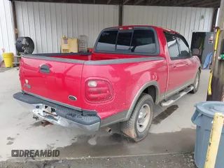2003 Ford F-150 XLT with VIN 1FTRW07L13KD50168, listed as a IAAI auction lot 42815811 with Not provided miles and . Bid and sale history available at DreamBid. Image 4.