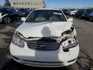 2003 Toyota Corolla CE with VIN 1NXBR32EX3Z057713, listed as a Copart auction lot 85710344 with 188,478 mi miles and Salvage Title. Bid and sale history available at DreamBid. Image 5.