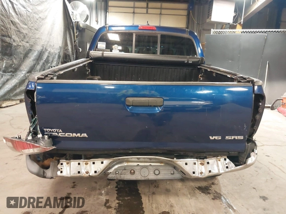 2014 Toyota Tacoma with VIN 3TMLU4EN4EM156933, listed as a IAAI auction lot 41197904 with 128,183 mi miles. Bid and sale history available at carsss.com. Image 16.