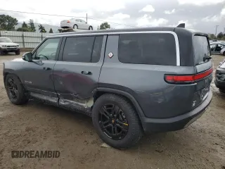 2023 Rivian R1S Adventure with VIN 7PDSGBBA5PN021048, listed as a Copart auction lot 44407815 with 10,642 mi miles and Salvage Title. Bid and sale history available at carsss.com. Image 2.
